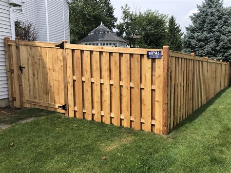 black metal gate with wooden shawdow box fence|shadow box fence home depot.